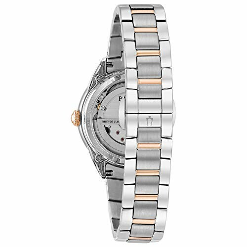 Back view of a luxury watch with metal bracelet